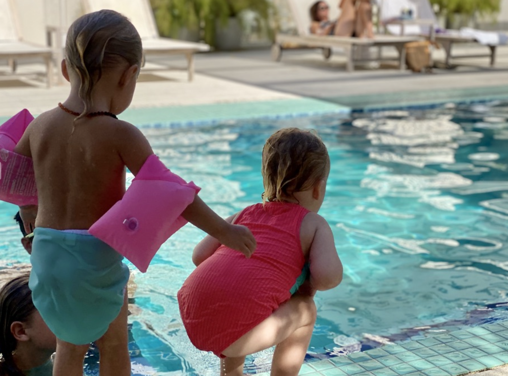 Kids at pool edge